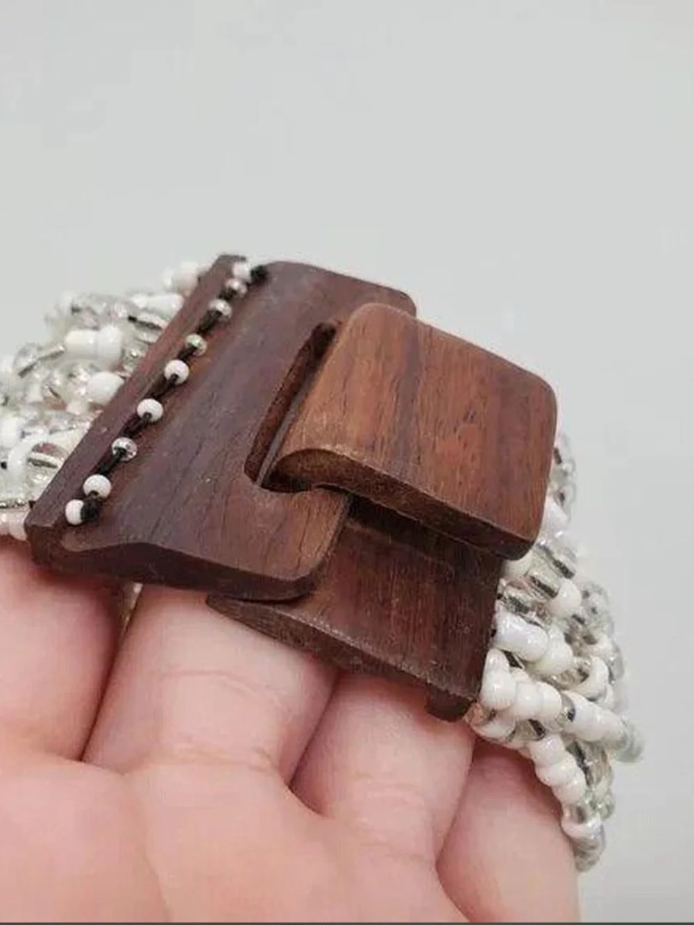 Handcrafted White Beaded Bracelet with Wooden Buckle